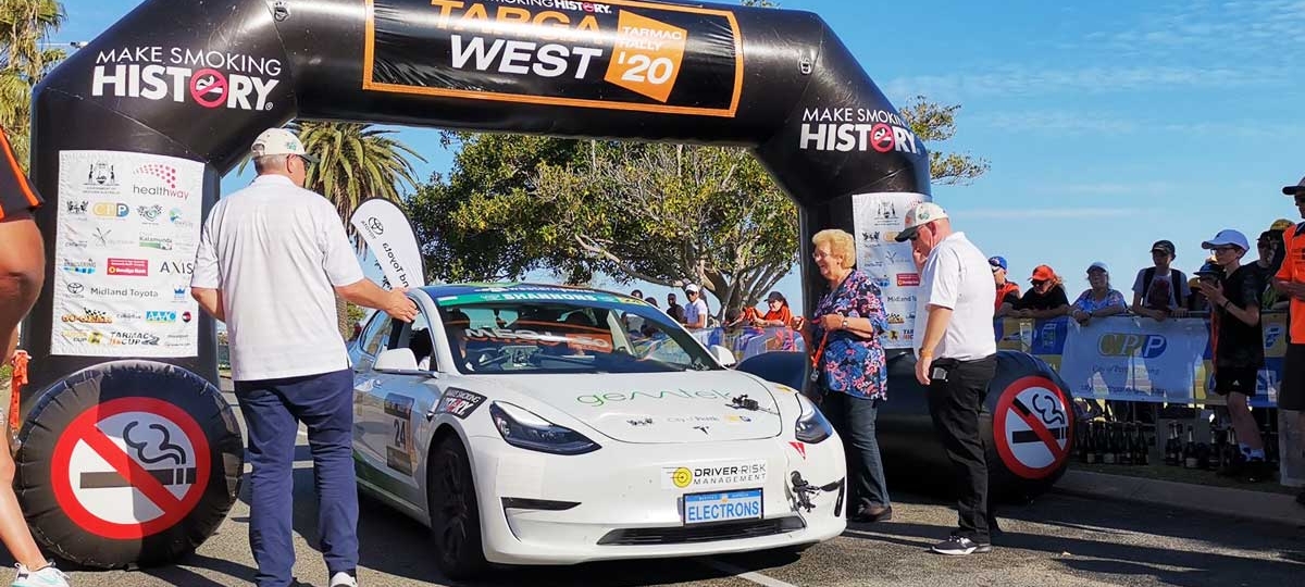 white tesla model 3 that won at targa west