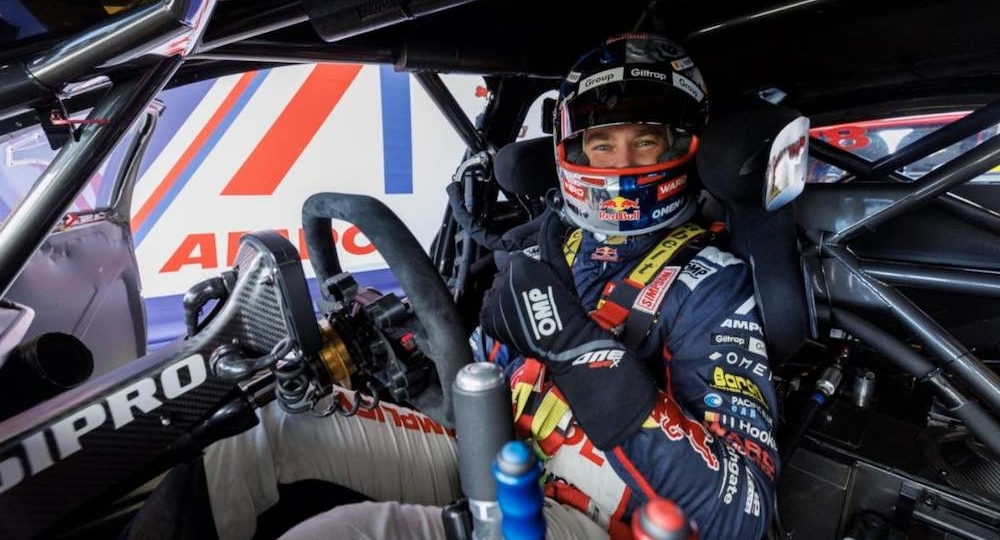 shane van gisbergen in the drivers seat of a race car