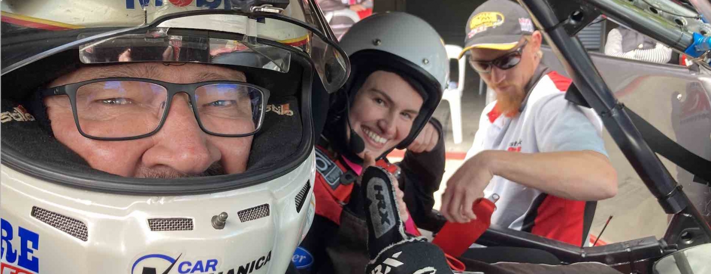 australian supercars legend john bowe with a passenger